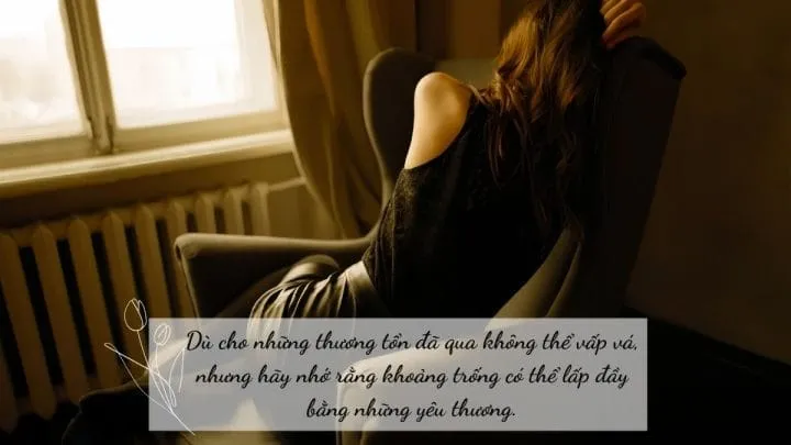 Một người ngồi gục đầu thể hiện sự mệt mỏi và bế tắc trong cuộc sống