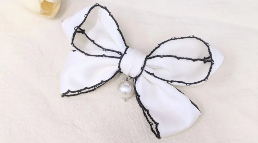 Nơ 4 cánh vải thể hiện phong cách chuyên nghiệp