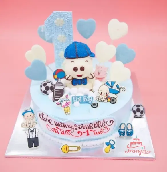 Bánh sinh nhật thôi nôi bé trai tuổi Hợi với hình chú heo hồng đáng yêu