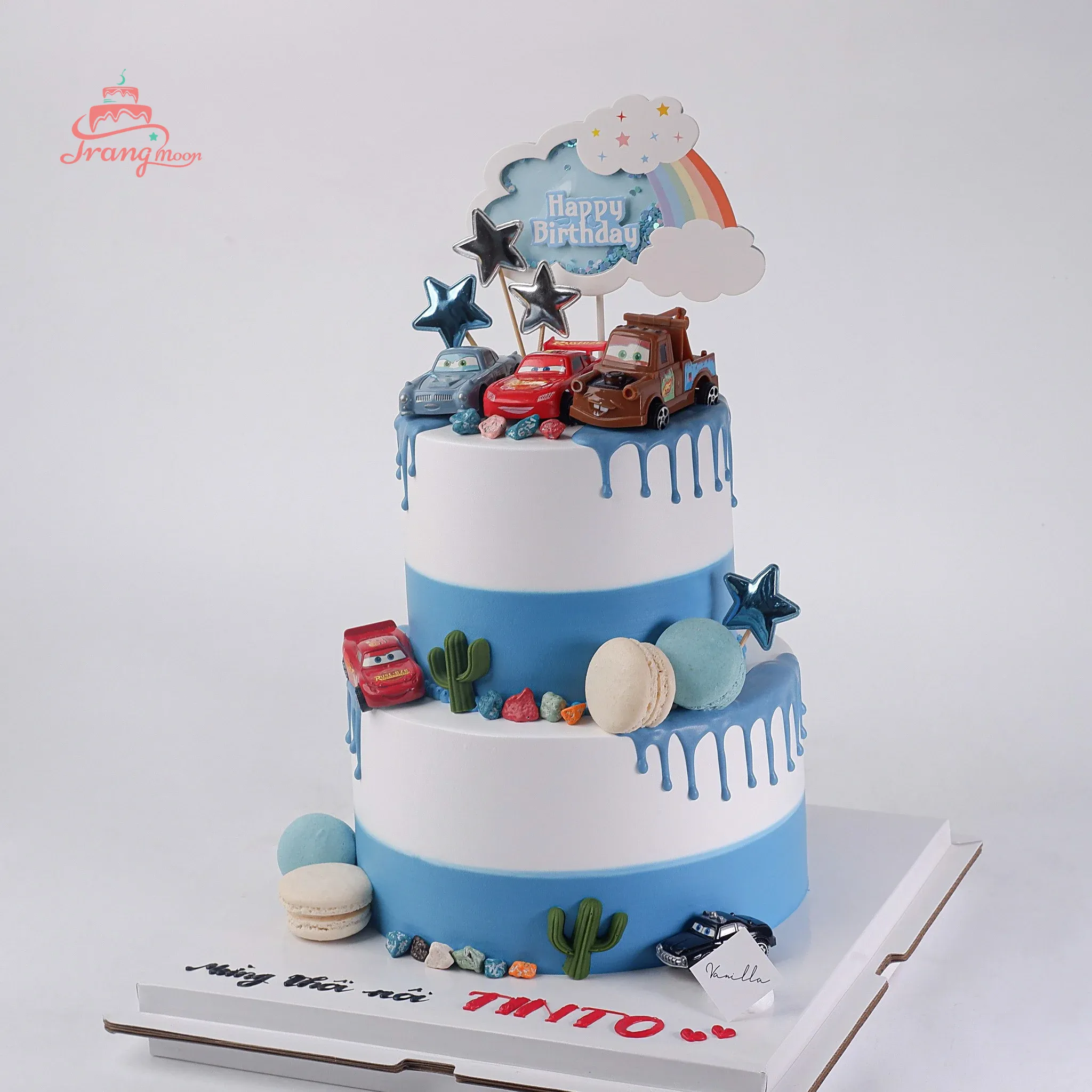 Bánh kem thôi nôi cho bé trai 2 tầng trang trí hình khủng long xanh