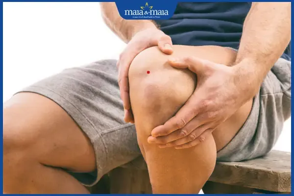 nốt ruồi son ở đầu gối nam